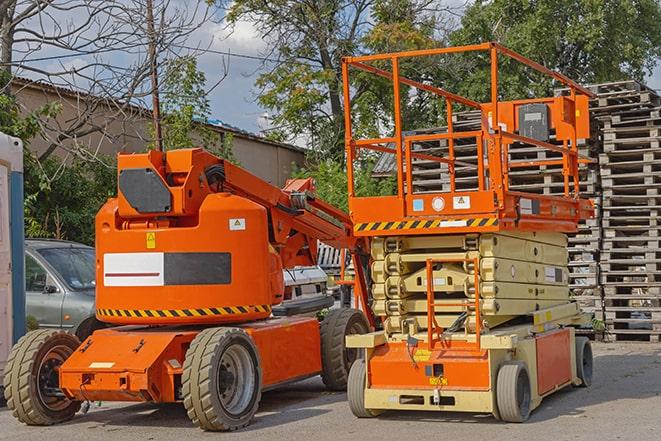 forklift lifting materials in a shipping warehouse in El Granada CA